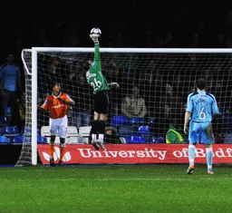 Safety first as Kevin Pilkington tips the ball over the bar