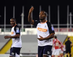 Mark Nwokeji salutes the travelling Hatters fans after scoring Town`s second goal
