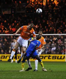 Alan White heads the ball forward