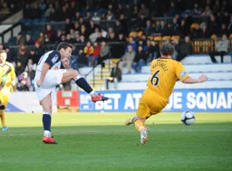 Kevin Gallen fires in a shot at goal