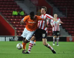 Mark Nwokeji gets in front of Morgan Schneiderlin