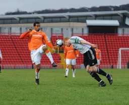James Curtis goes in where it hurts as Matthew Barnes-Homer moves in with a raised boot