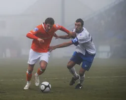 Kevin Nicholls gets past Mike Pearson