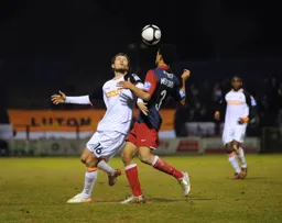 Rossi Jarvis and Jim Meredith watch the flight of the ball