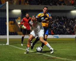 Liam Hatch tries to keep the ball in play