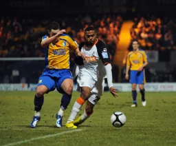 Matthew Barnes-Homer wriggles past his marker