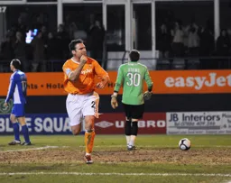 Kevin Gallen runs away after scoring Town`s third goal