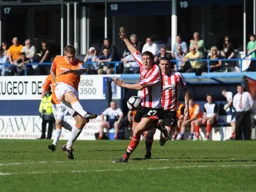 Simon Heslop`s shot is blocked