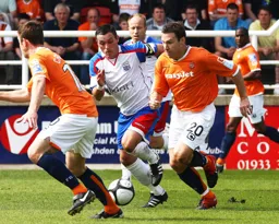 Kevin Gallen looks to find Tom Craddock