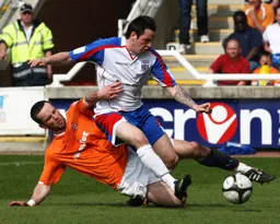 Fred Murray tackles Lee Tomlin