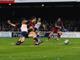 Tom Craddock`s shot goes wide and another chance goes begging