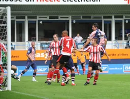 Zdenek Kroca scores the Town's first in an opening day victory