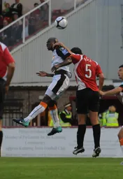 Claude Gnapka under pressure from former Luton hero Ian Roper
