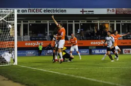 Gallen and Drury celebrates Zdenek Kroca's goal as he wheels away on the right of the photo