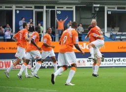 Pilkington and Adam Murray celebrate