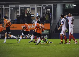 Amari Morgan-Smith wheels away having scored for the Town on his debut in a crazy 2-0 win