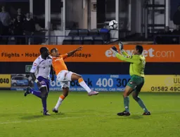 Matthew Barnes-Homer stretching but to no avail as Crawley take all three points