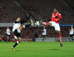 Matthew Barnes-Homer loses out in this high foot duel