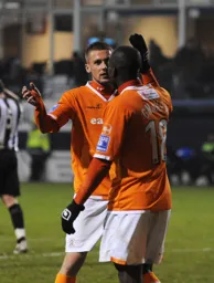 Claude Gnapka and Dan Walker celebrate the formers goal on the night