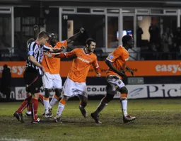 Claude Gnapka leads another dance to celebrate scoring the only goal of the game