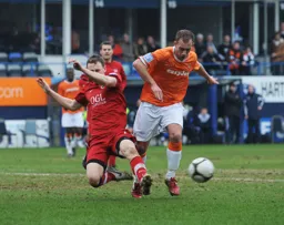 Jake Howells evades the Kidderminster harrying