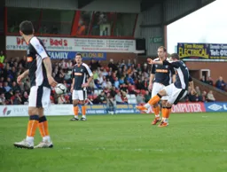 Robbie Willmott firing in the Towns first goal