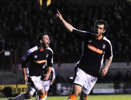 Alex Lawless celebrates scoring the Luton goal