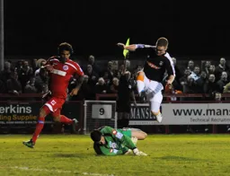 Jason Walker showing his normal non-stop effort but as the flag in the background shows it was wasted this time