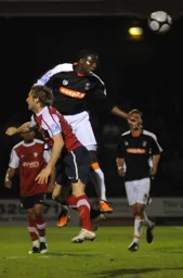 Claude Gnapka wins another towering header