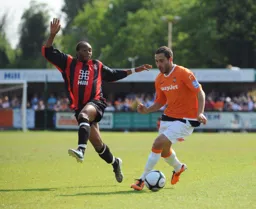 Robbie Willmott shows his magic feet to keep the Histon defender on his toes