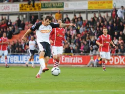 Alex Lawless hits a thunderous first goal in a fantastic away performance in the play off first leg