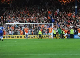 Mark Tyler celebrates his critical penalty save which was vital as the Town clinched their place in the Play-Off final