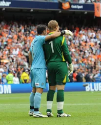 Despite not conceding to the Wombles in 5 hours of football that season it was down to penalties as the keepers embrace