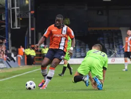 Amari Morgan-Smith leaves Jonathan Sanchez-Munoz sprawling on the turf