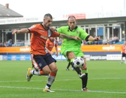 Alex Lawless in a tussle for the ball