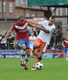 Alex Lawless tries to get away from Ashley Chambers