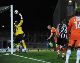 Tommy Wright heads in the only goal of the game