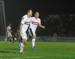 Danny Crow celebrates his goal with 1090 Jake Howells