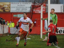 The ball is in the net and Danny Crow is off to celebrate his first goal