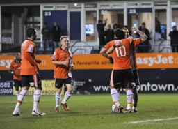 Celebration time after Alex Lawless had scored the third goal