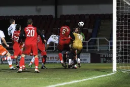 Janos Kovacs heads in Town`s fourth goal