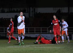 Greg Taylor has just scored Town`s fourth goal