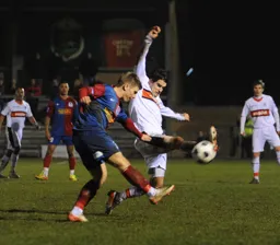 James Dance attempts to block a clearance