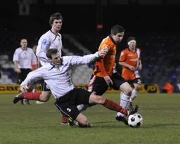 Brett Longden gets past Mark Dudley