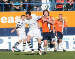 John-Paul Kissock gets a forearm across his throat