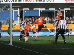 Janos Kovacs towering header opens the scoring