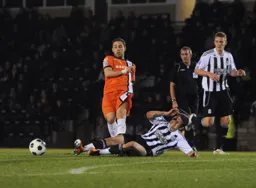 A last ditch tackle takes the ball away from Robbie Willmott