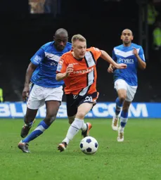 Adam Watkins gets away from Jamal Fyfield