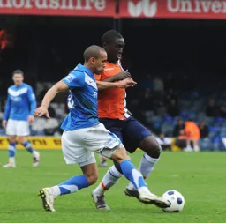 Curtis Osano tries to get past Ashley Chambers