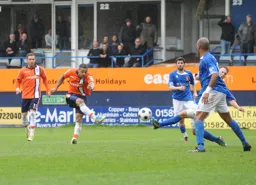 Andre Gray hammers home Town`s fourth goal